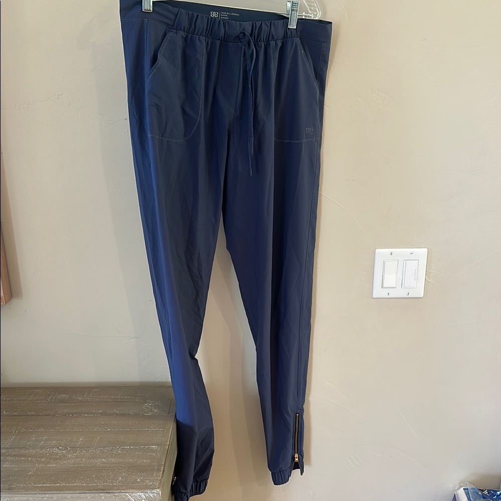 Albion Blue Joggers with Elastic Waistband and Tapered Legs and Gold Zipper